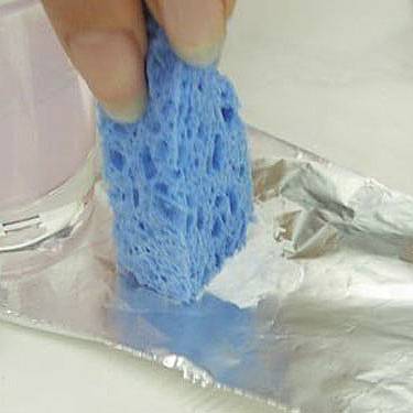                                              Dip the sponge into the acrylic paint.
                                             