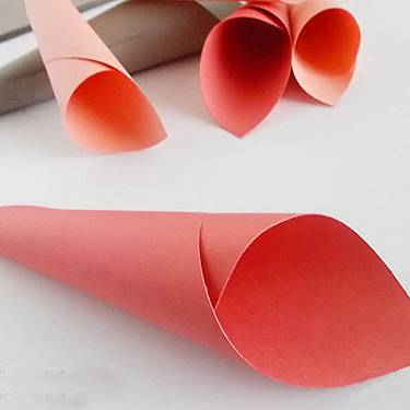                                              Cut a circle from the cardboard with 20 cm diameter. After that from the colored paper make different in size cones.
                                             